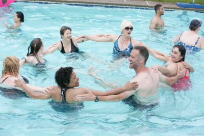 Synchronized swimming at summer camp for grown ups. 