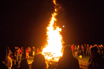 Bonfire with people around